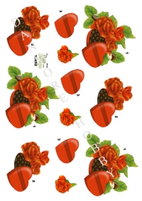 Billede: hjerteæske med chokolade ved blomster, dan-design