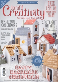 Billede: DoCrafts Creativity Magasin november 2016 incl. julekrans i styropor og pompom, 10 små kuverter i kraftpapir.