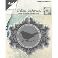 Billede: skære/prægeskabelon præget fugl på baggrund og snørklet ramme omkring, JOY CUT/EMB “Background with Bird, førpris kr. 91,00, nupris